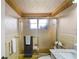 Cozy bathroom with glass-enclosed shower and marble-topped vanity at 15635 Bertram Dr, Hudson, FL 34667