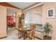 Cozy breakfast nook with decorative window, table, and plant at 18216 Monteverde Dr, Spring Hill, FL 34610