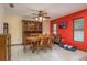 Inviting dining room features a wooden dining set and a hutch, perfect for Gathering meals and gatherings at 18216 Monteverde Dr, Spring Hill, FL 34610
