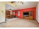 Spacious multi-purpose room with adjacent dining area, large television, and ample seating at 18216 Monteverde Dr, Spring Hill, FL 34610