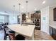 Kitchen view with a large island and stainless steel appliances, and pendant lighting at 19879 Tattnall Way, Brooksville, FL 34601