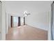 Spacious bedroom with ample natural light, laminate wood flooring and ceiling fan at 2221 Swedish Dr # 15, Clearwater, FL 33763