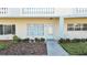 Charming condo exterior with well-maintained landscaping and natural light at 2221 Swedish Dr # 15, Clearwater, FL 33763