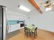 Bright eat-in kitchen featuring stainless steel appliances and white cabinetry at 2221 Swedish Dr # 15, Clearwater, FL 33763