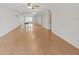 Open-concept living room with hardwood flooring, ceiling fan and lots of natural light at 2221 Swedish Dr # 15, Clearwater, FL 33763