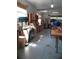 Spacious workshop area equipped with various tools and workbenches, perfect for DIY projects and hobbies at 2221 Swedish Dr # 15, Clearwater, FL 33763