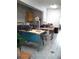 Spacious workshop with worktables, tools, and ample lighting at 2221 Swedish Dr # 15, Clearwater, FL 33763