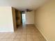Spacious living room with tile flooring and easy access to other living spaces at 4217 Terrapin Pl # 4217, New Port Richey, FL 34652