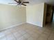 Open living space with tile flooring and a ceiling fan at 4217 Terrapin Pl # 4217, New Port Richey, FL 34652