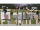 An aerial view shows canal front homes, boats and boat lifts, and a community pool at 4400 Floramar Ter, New Port Richey, FL 34652