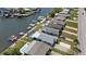 Waterfront homes feature private docks and sparkling pools, offering a serene coastal lifestyle at 4400 Floramar Ter, New Port Richey, FL 34652