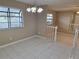 Inviting dining area with tile floors and neutral decor, offering a comfortable space for meals at 4503 Sheffield Rd, Land O Lakes, FL 34639