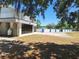 Exterior view of community building near parking and swimming pool at 4503 Sheffield Rd, Land O Lakes, FL 34639