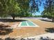 Community shuffleboard is set in a grassy area near walking path and playground at 4503 Sheffield Rd, Land O Lakes, FL 34639