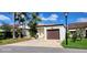Charming single story home with a well maintained front yard and a one car garage at 4548 Somerset Pl, New Port Richey, FL 34652