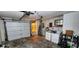 Spacious garage with a functional washer/dryer, offering convenient laundry and storage solutions at 4548 Somerset Pl, New Port Richey, FL 34652