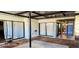Expansive patio with sliding glass doors, providing seamless access to indoor and outdoor spaces at 4548 Somerset Pl, New Port Richey, FL 34652