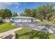 Expansive driveway with access to a multi-car garage and well-manicured lawn at 4573 Ontario Dr, New Port Richey, FL 34652