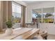Inviting dining area with bright windows, stylish decor, and a view of the outdoors at 4731 Egret Rd, Venice, FL 34293