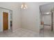 A view of the dining room, looking towards the front door at 512 Winding Willow Dr, Palm Harbor, FL 34683