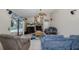 Living Room features stone fireplace and a view of the pool at 512 Winding Willow Dr, Palm Harbor, FL 34683