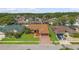 Well-maintained home with brick driveway and manicured lawn in a desirable neighborhood at 5411 Wellfield Rd, New Port Richey, FL 34655