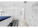 Bright bedroom with white furniture and multiple closets at 5676 Legend Hills Ln, Spring Hill, FL 34609