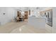 Open kitchen with dining area and modern stainless steel appliances at 5676 Legend Hills Ln, Spring Hill, FL 34609