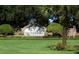 Silverthorn community sign surrounded by mature trees and colorful landscaping at 5676 Legend Hills Ln, Spring Hill, FL 34609