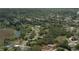 An aerial image of the property highlighting the home's location in a developed residential area at 6516 Hillview Rd, Spring Hill, FL 34606