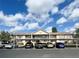 Apartment building with assigned covered parking at 6527 Spring Flower Dr # 24, New Port Richey, FL 34653