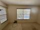 Bright, spacious bedroom with ample natural light and views, ready for personalized decor at 6527 Spring Flower Dr # 24, New Port Richey, FL 34653