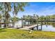 Scenic waterfront property with a private boat dock, providing direct access to the open water at 6552 River Rd, New Port Richey, FL 34652