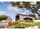 Covered bridge and fire hydrant next to community home at 6710 Hickorywood Ln # 1B, New Port Richey, FL 34653