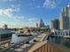 Picturesque aerial view showcases the cityscape, bridge, waterfront, and boats on a clear day at 700 S Harbour Island Blvd # 413, Tampa, FL 33602