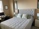 Comfortable bedroom with tufted headboard and coordinated decor at 700 S Harbour Island Blvd # 413, Tampa, FL 33602