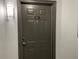 Unit 413 features a secure, solid door and modern lighting for a warm welcome at 700 S Harbour Island Blvd # 413, Tampa, FL 33602