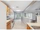 Spacious kitchen with easy access to sunroom and living areas at 7522 Heather Walk Dr, Weeki Wachee, FL 34613