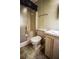 Bathroom featuring a shower, toilet, and sink with a classic design, ideal for relaxation at 846 Oakwood Dr, Tarpon Springs, FL 34689