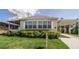 Charming mobile home with well-manicured lawn and carport at 846 Oakwood Dr, Tarpon Springs, FL 34689