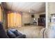 Spacious living room with large windows and comfortable seating at 846 Oakwood Dr, Tarpon Springs, FL 34689
