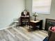 Bedroom showcasing vintage vanity, classic accents, and window, perfect for relaxation at 9136 Mark Twain Ln, Port Richey, FL 34668