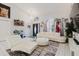 Spacious living room featuring tile floors, modern decor, and lots of natural light at 9301 Tournament Dr, Hudson, FL 34667