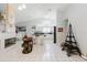 Spacious home featuring open living area, a wine bar, kitchen, and dining area at 9301 Tournament Dr, Hudson, FL 34667