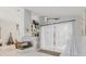 Bright living room area with fireplace and large window at 9301 Tournament Dr, Hudson, FL 34667