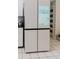 White refrigerator features a smart screen, adding a modern touch to this kitchen at 9301 Tournament Dr, Hudson, FL 34667