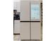 White refrigerator features a smart screen, adding a modern touch to this kitchen at 9301 Tournament Dr, Hudson, FL 34667