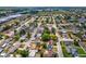 Expansive aerial view shows the neighborhood layout and proximity to community amenities at 9316 Whitman Ln, Port Richey, FL 34668