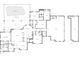 Detailed floor plan illustrating the layout of the home, garage, and attic spaces at 10110 Weeks Dr, Brooksville, FL 34601