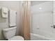 Bathroom featuring a bathtub with shower and towel racks at 12272 Rangeland Blvd, Odessa, FL 33556